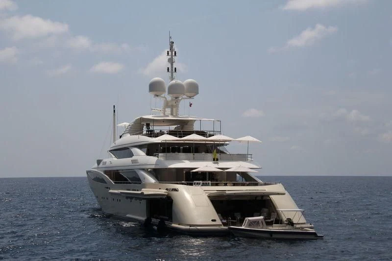 a white yacht on the water aboard KOLAHA Yacht for Sale