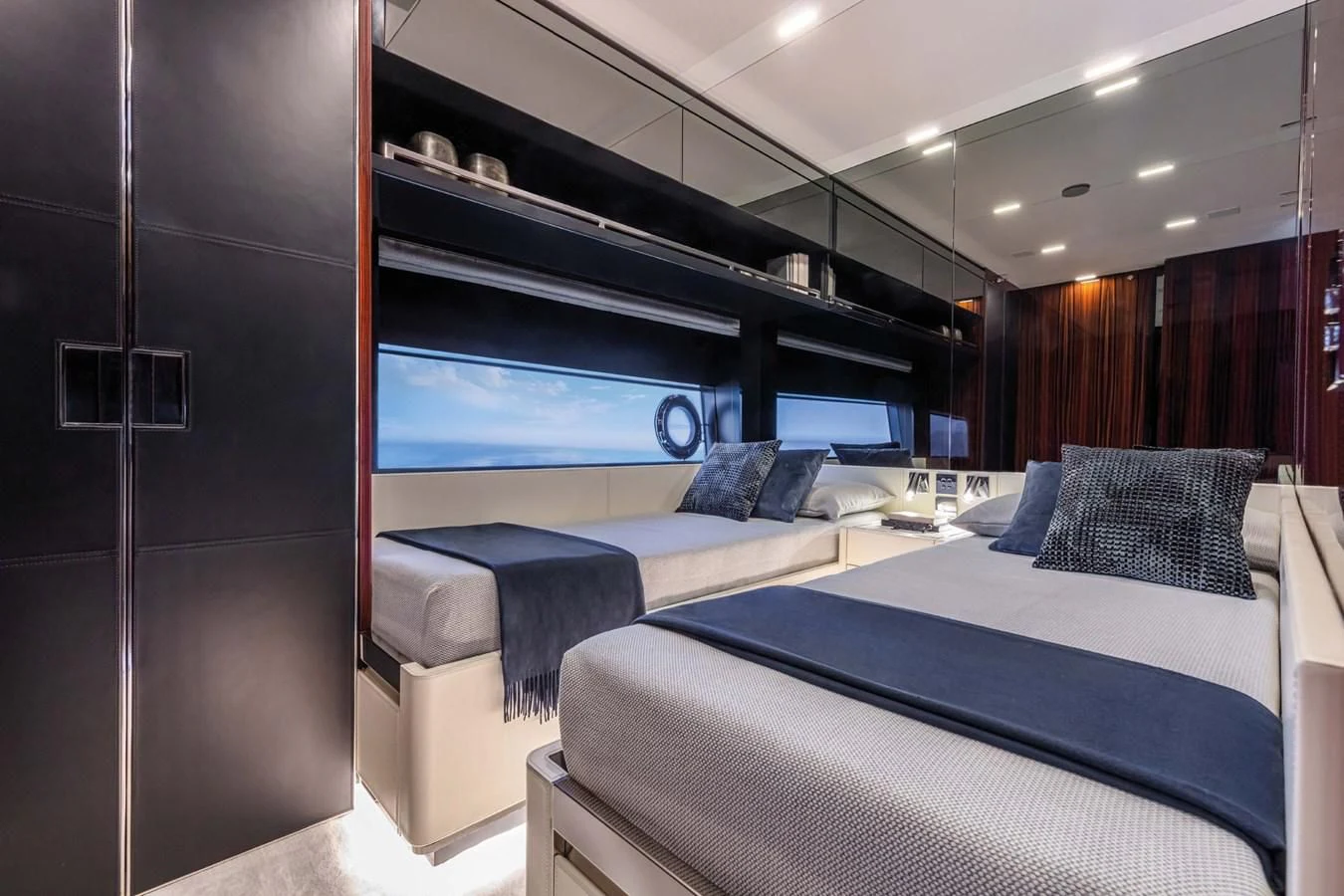 a room with a bed and a tv aboard LISOLO Yacht for Sale