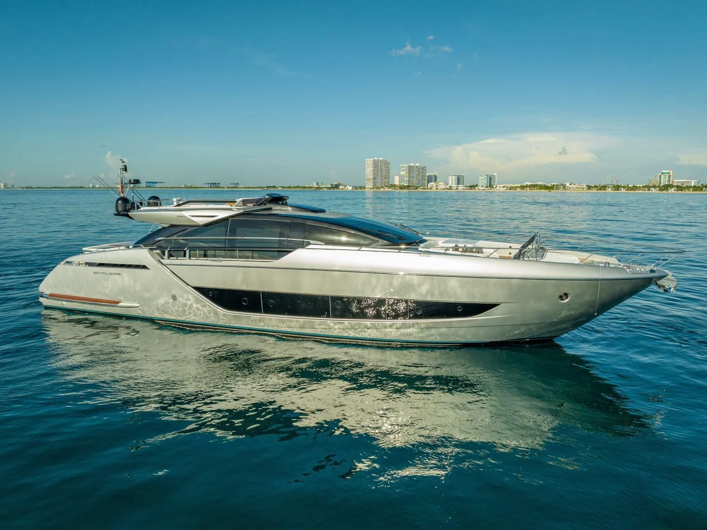 a white boat on the water aboard LISOLO Yacht for Sale