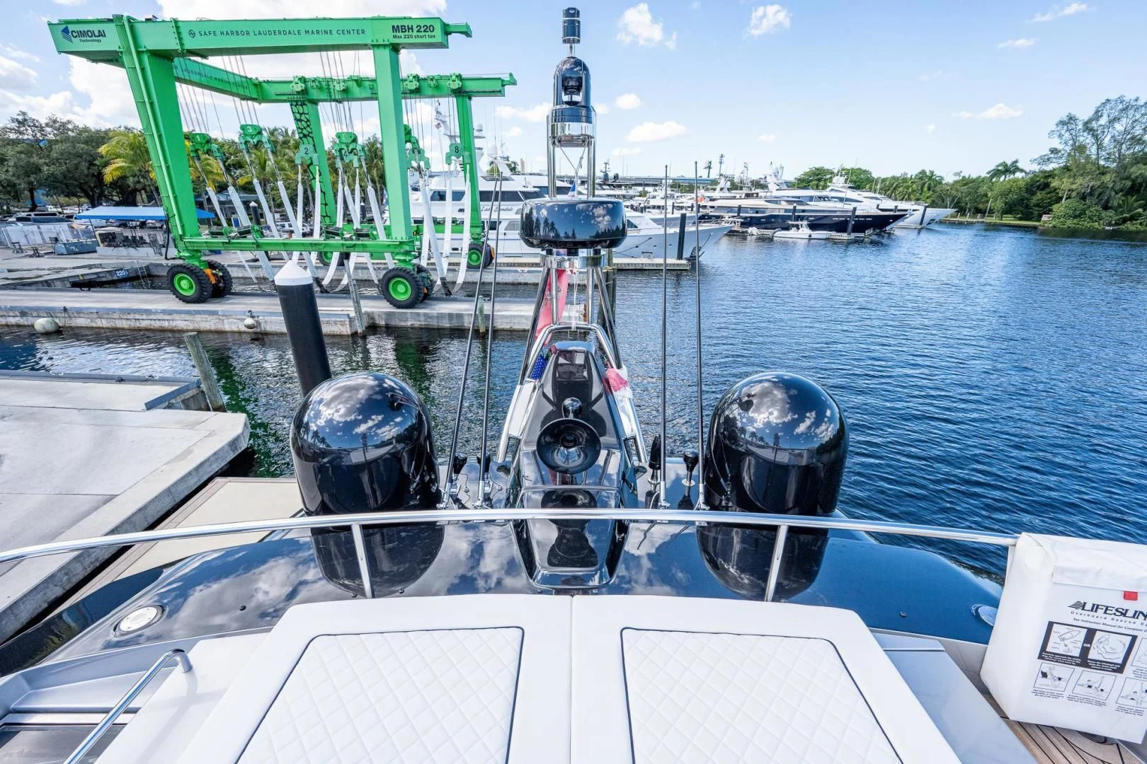 a boat with a large green machine on it aboard LISOLO Yacht for Sale