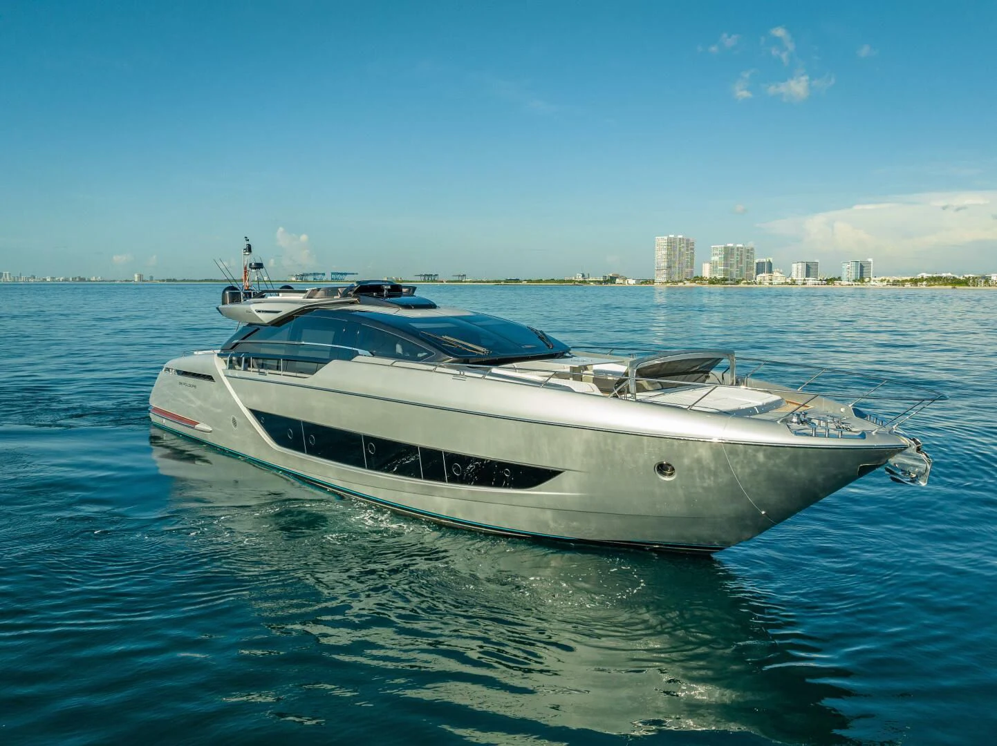 a white yacht in the water aboard LISOLO Yacht for Sale
