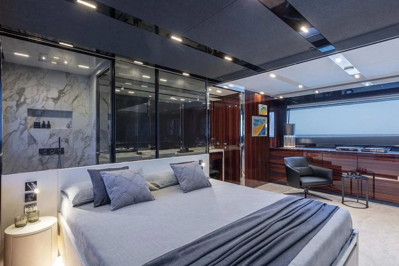 a large bed in a room aboard LISOLO Yacht for Sale