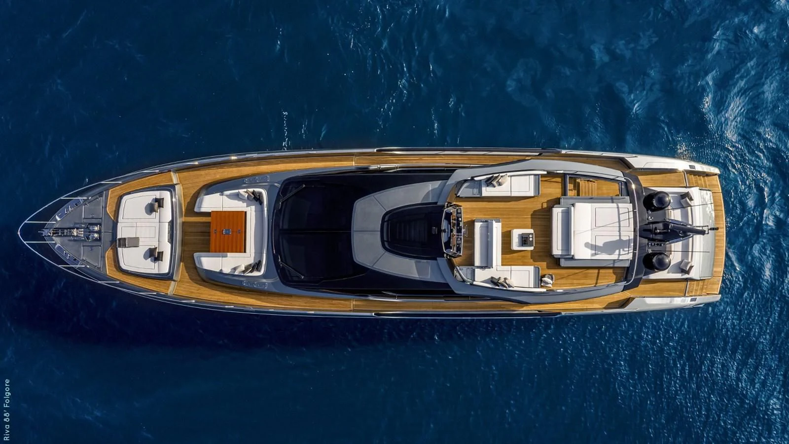 a yellow and blue boat aboard LISOLO Yacht for Sale