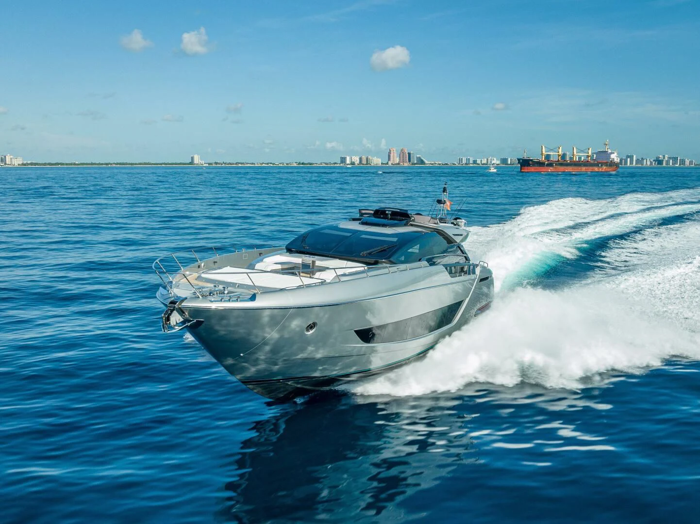 a white yacht on the water aboard LISOLO Yacht for Sale