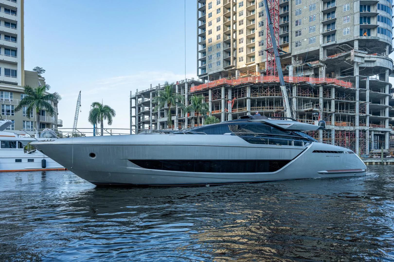 a white yacht in the water aboard LISOLO Yacht for Sale