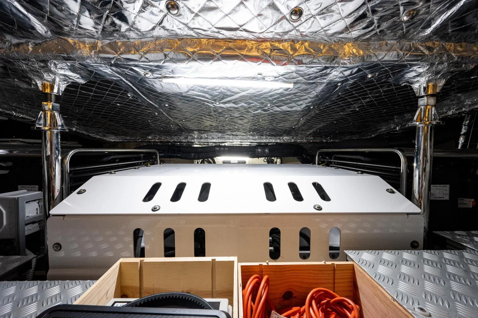 a large white boat in a large building aboard LISOLO Yacht for Sale