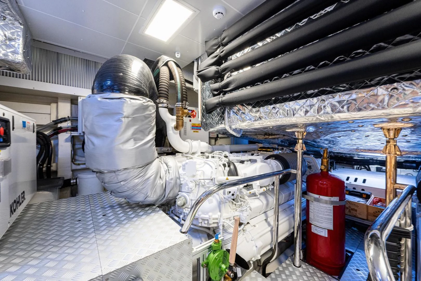 a person in a white coat in a factory aboard LISOLO Yacht for Sale