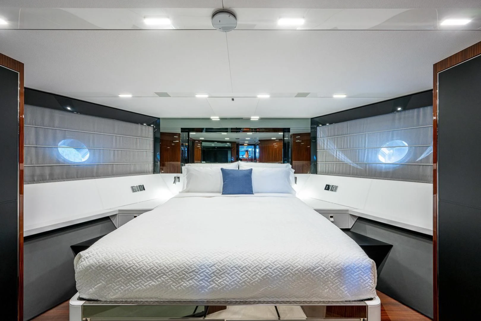 a room with a bed and a window aboard LISOLO Yacht for Sale