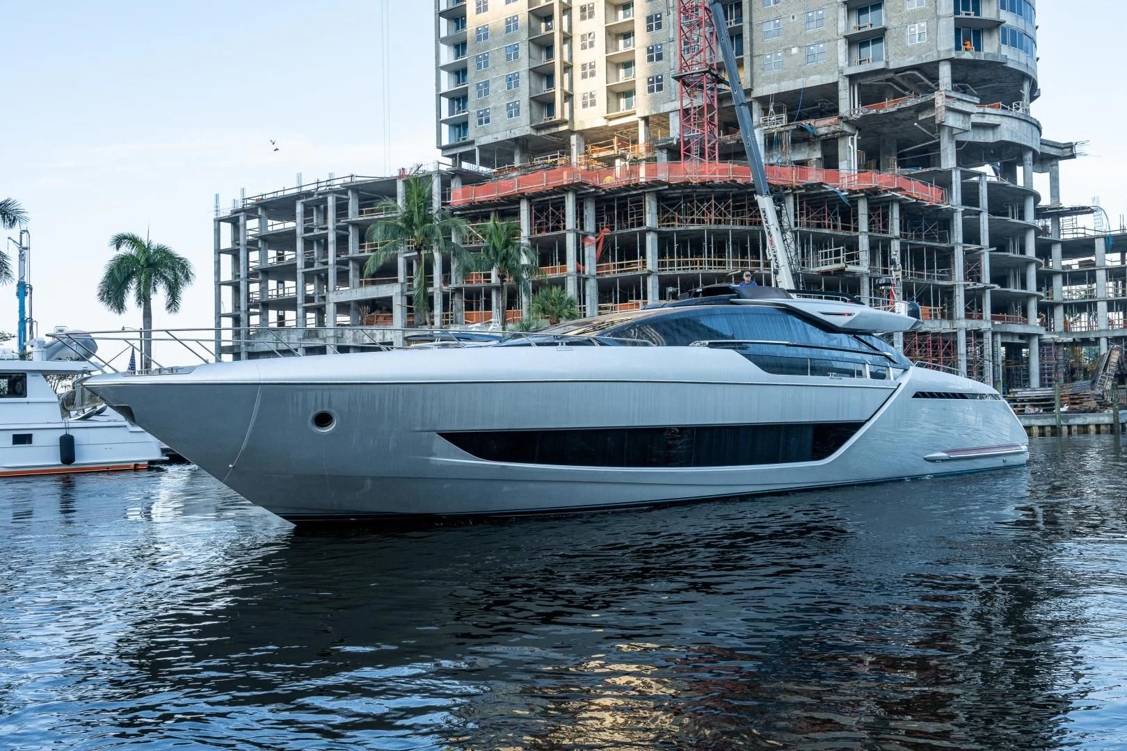a white yacht in the water aboard LISOLO Yacht for Sale