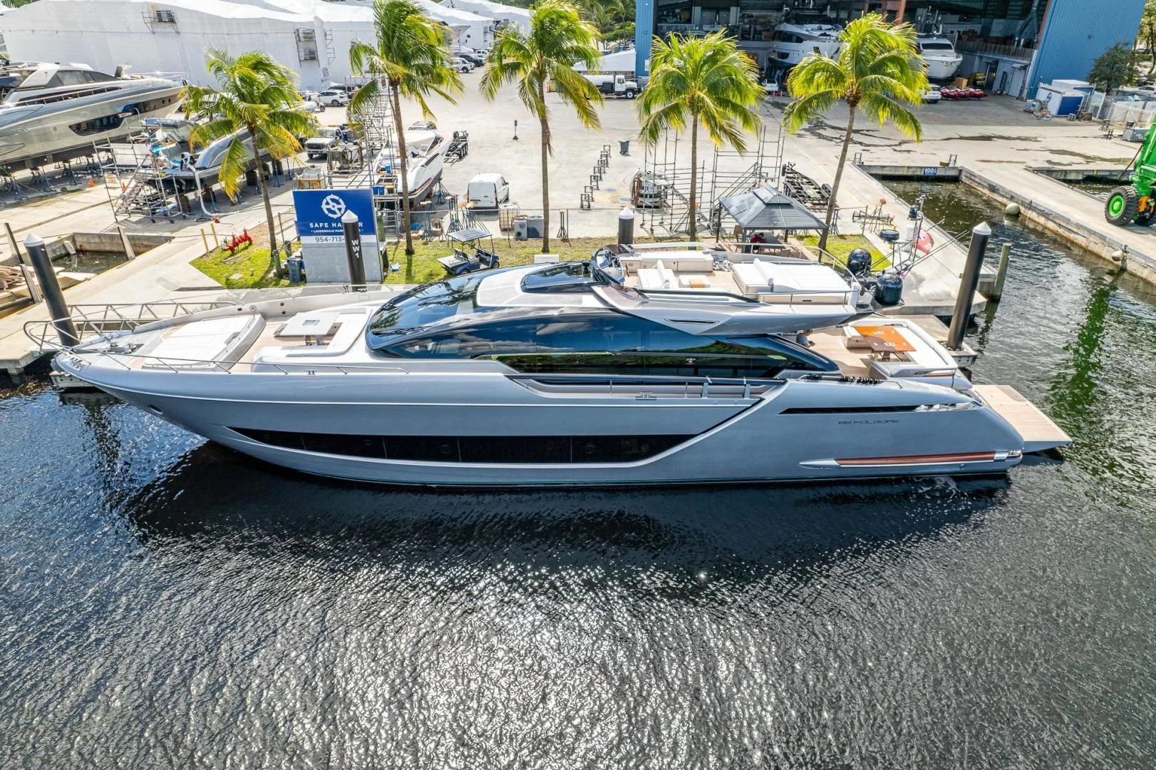 a row of boats on a beach aboard LISOLO Yacht for Sale