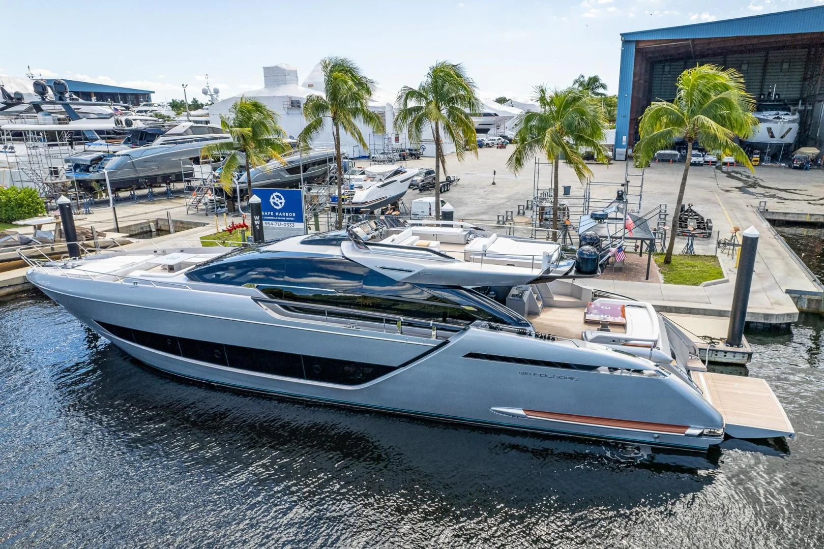 a row of boats on a beach aboard LISOLO Yacht for Sale