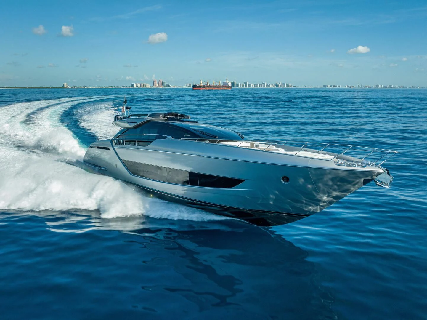 a white yacht in the water aboard LISOLO Yacht for Sale