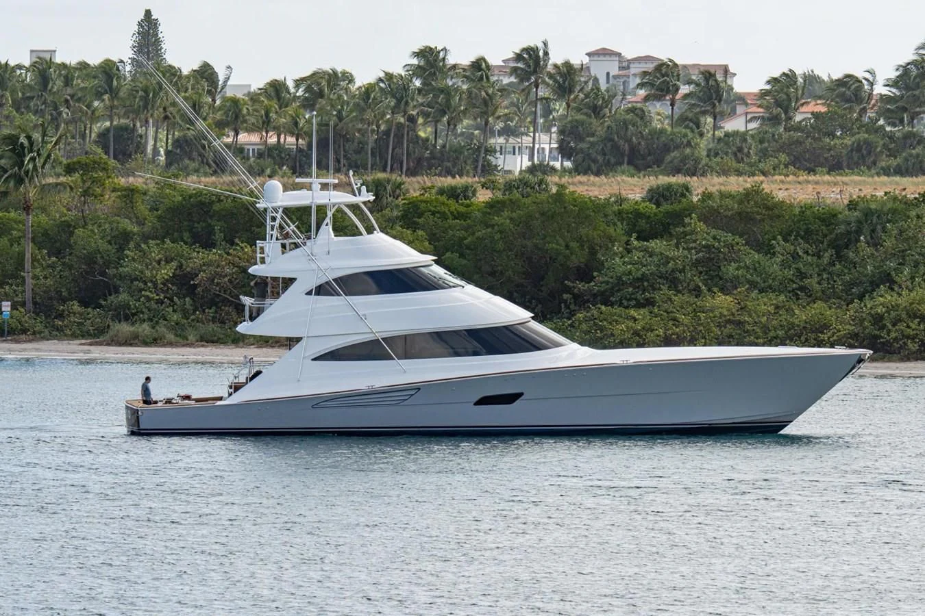 a white yacht on the water aboard HEAVY ACTION Yacht for Sale