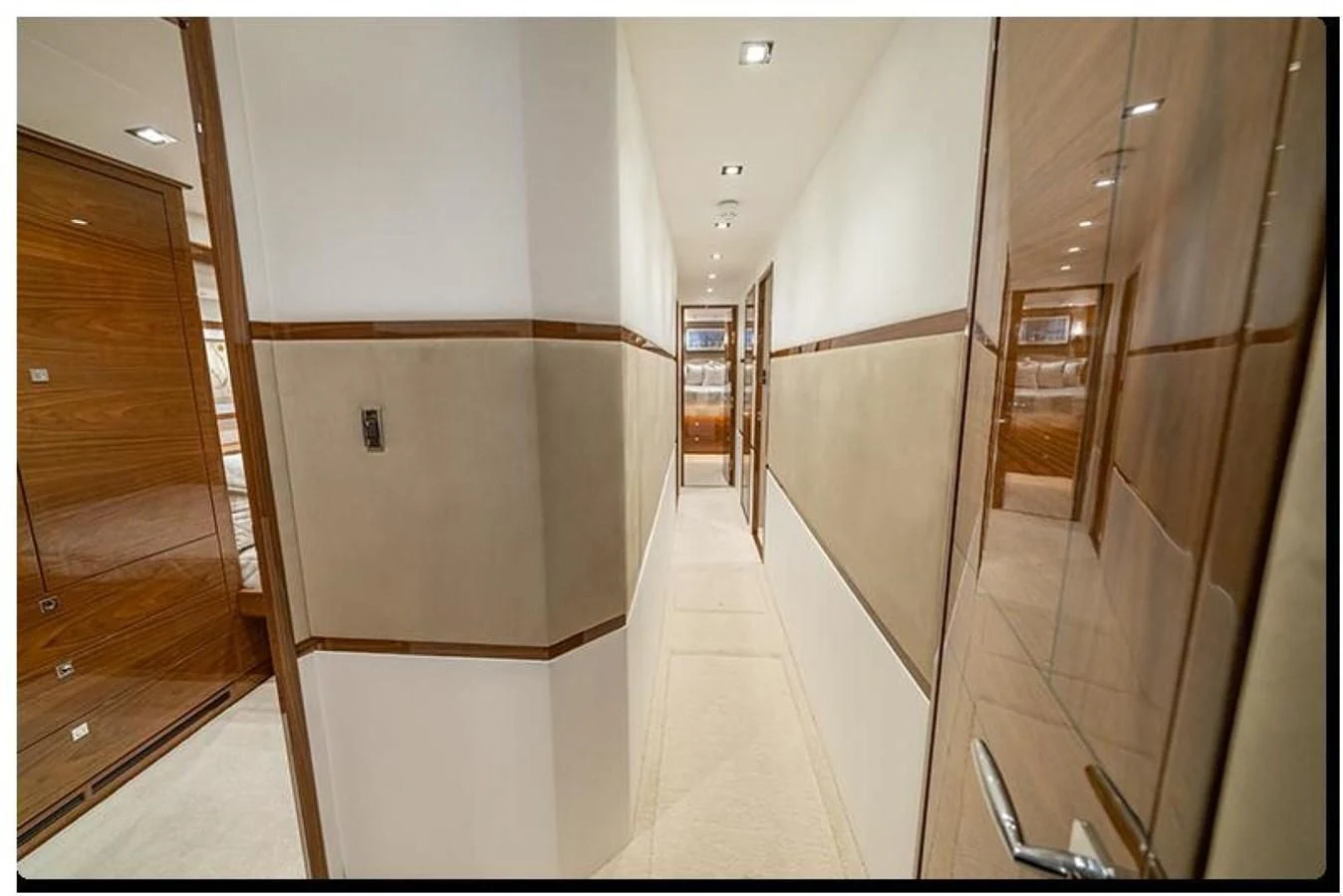 a hallway with doors aboard HEAVY ACTION Yacht for Sale