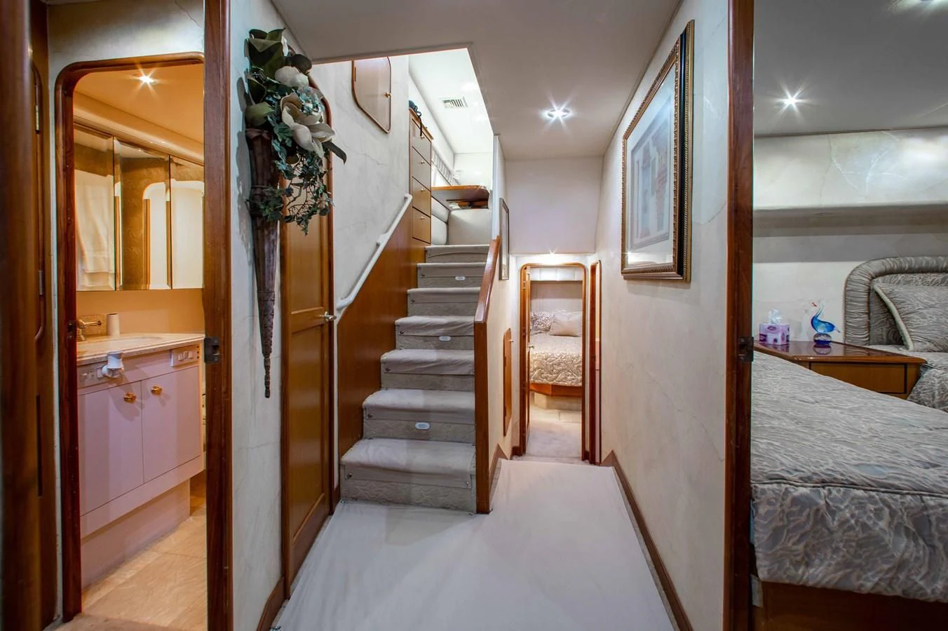 a room with a staircase and a bed aboard ONE MORE TIME Yacht for Sale