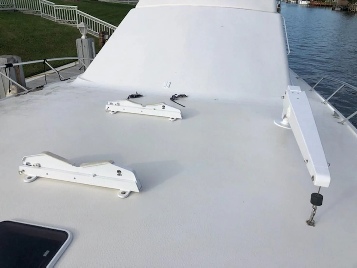 a white boat on the water aboard ONE MORE TIME Yacht for Sale