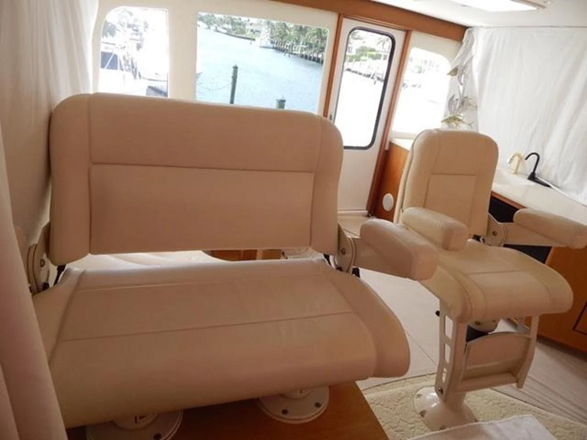 a couch in a room aboard ONE MORE TIME Yacht for Sale