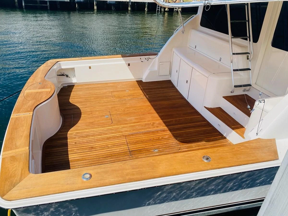 a wooden boat on a deck aboard ONE MORE TIME Yacht for Sale