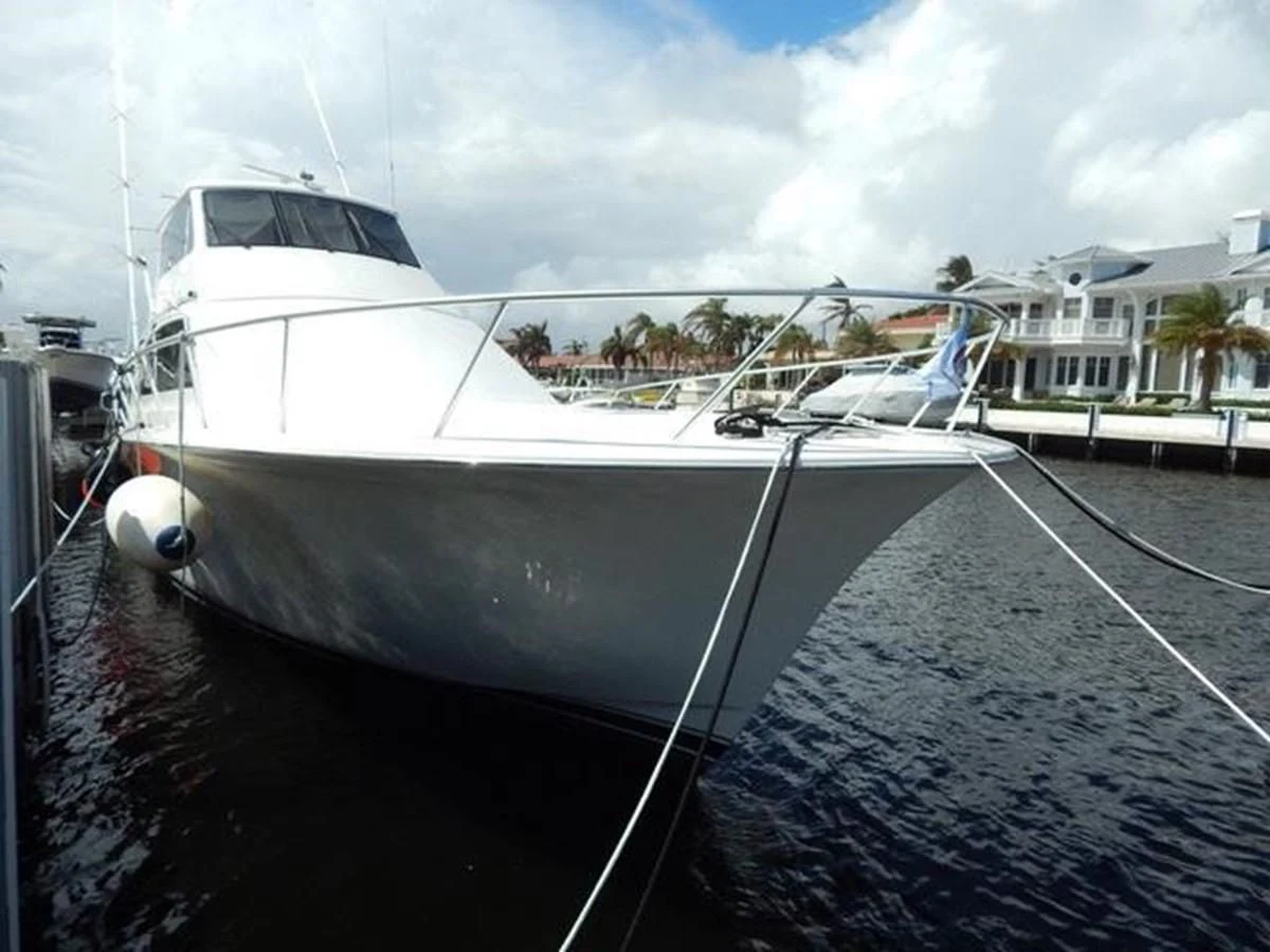a white boat docked aboard ONE MORE TIME Yacht for Sale