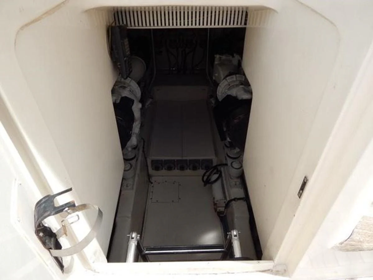 a car with its doors open aboard ONE MORE TIME Yacht for Sale