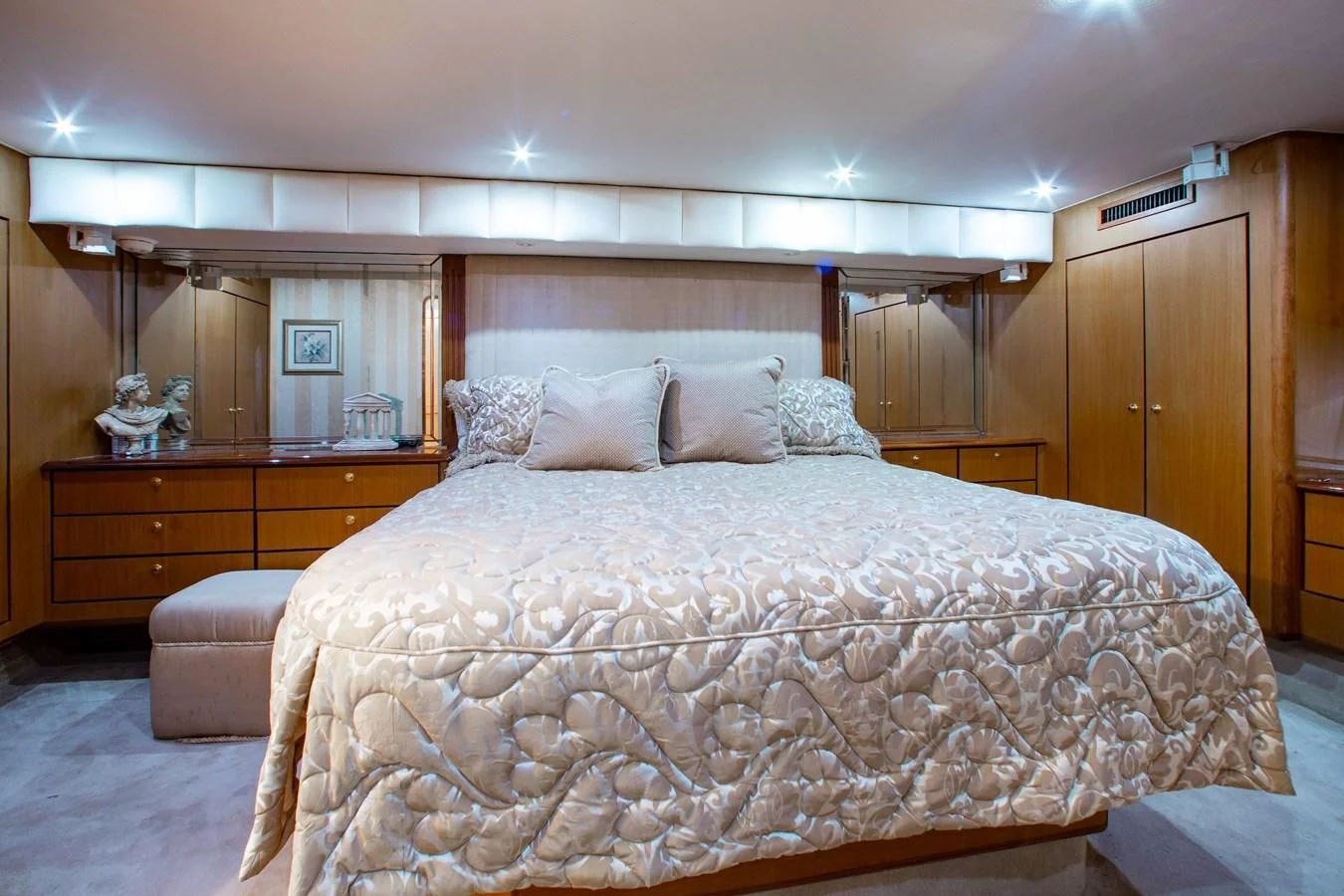a bed with white sheets aboard ONE MORE TIME Yacht for Sale