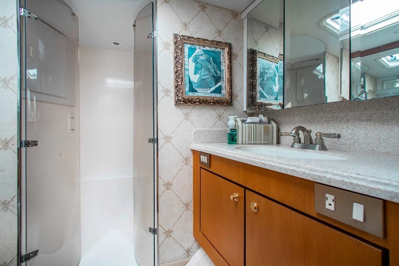 a bathroom with a sink and a mirror aboard ONE MORE TIME Yacht for Sale