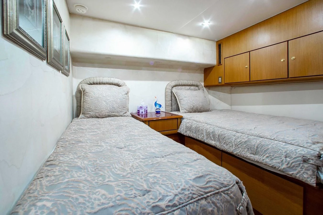 a couple of beds in a room aboard ONE MORE TIME Yacht for Sale