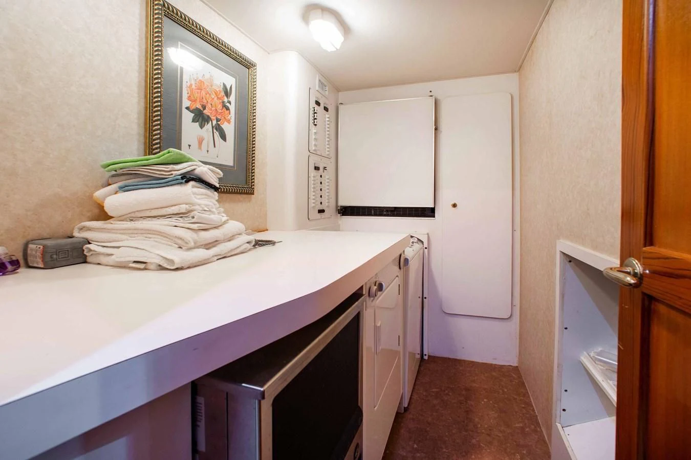 a kitchen with a sink and cabinets aboard ONE MORE TIME Yacht for Sale