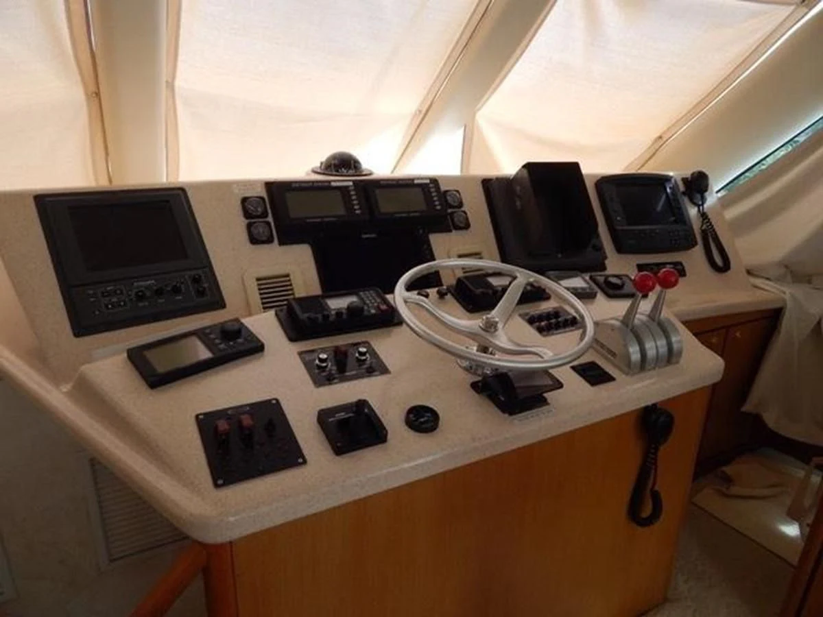 a table with electronics and other electronics on it aboard ONE MORE TIME Yacht for Sale