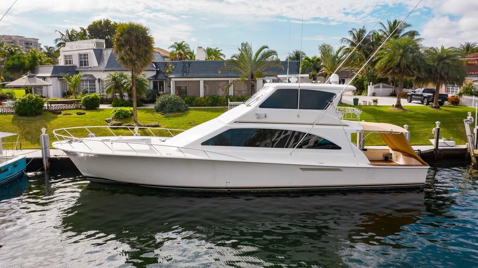 a white boat in a body of water aboard ONE MORE TIME Yacht for Sale