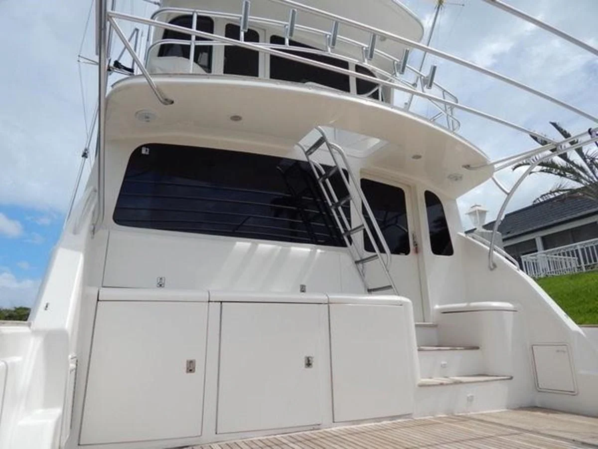 a white boat with a door open aboard ONE MORE TIME Yacht for Sale