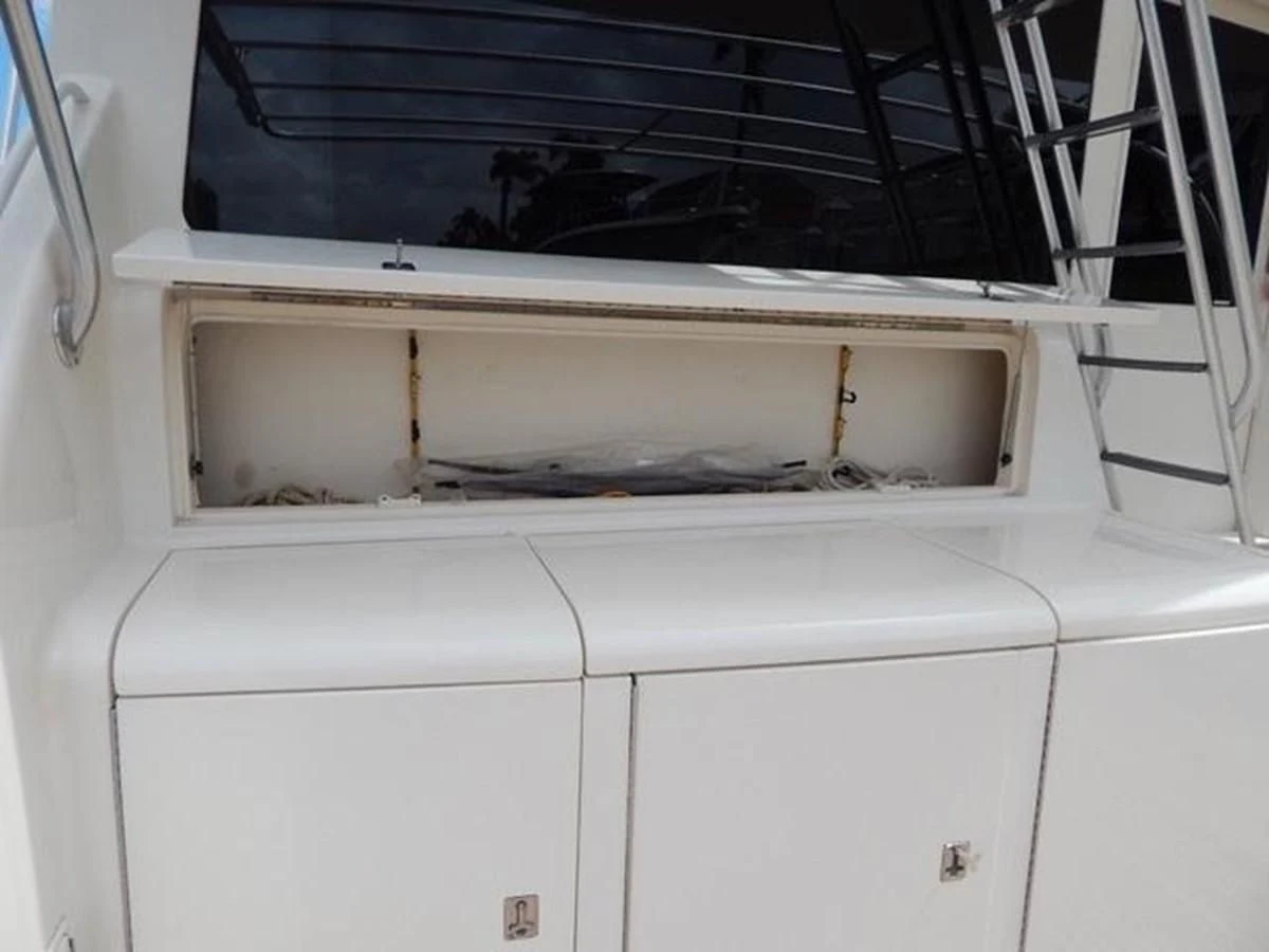 a white cabinet with a vent aboard ONE MORE TIME Yacht for Sale