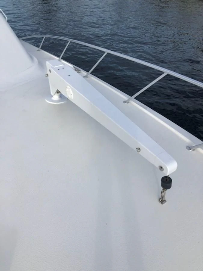 a white boat on the water aboard ONE MORE TIME Yacht for Sale