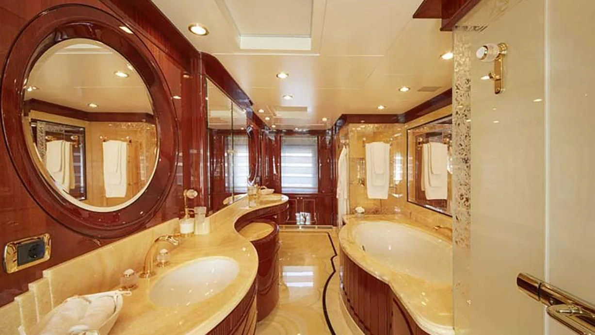 a bathroom with a large mirror aboard FORWIN Yacht for Sale