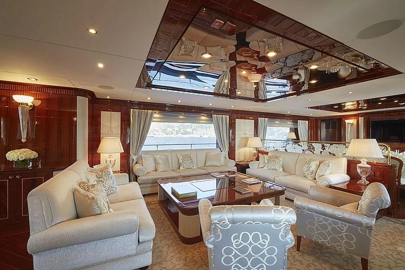 a living room with a couch and a table aboard FORWIN Yacht for Sale