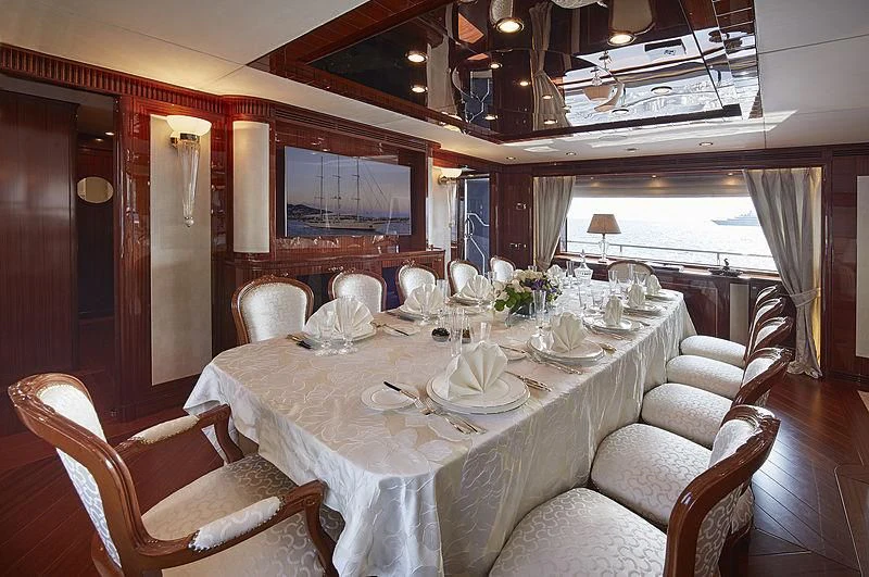 a dining table set for a dinner aboard FORWIN Yacht for Sale