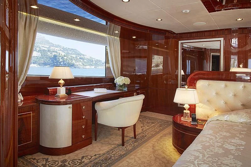a room with a desk and a bed aboard FORWIN Yacht for Sale