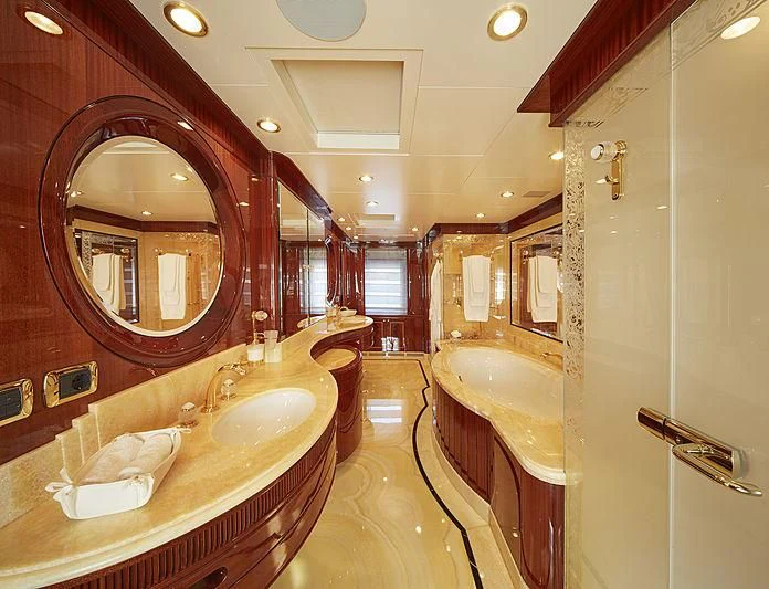 a bathroom with a large mirror aboard FORWIN Yacht for Sale