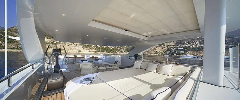 a room with a large white bed and a large window aboard FORWIN Yacht for Sale