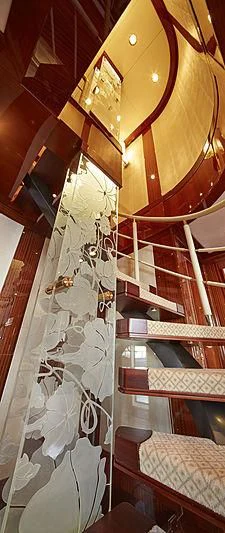 a room with a bed and a window aboard FORWIN Yacht for Sale