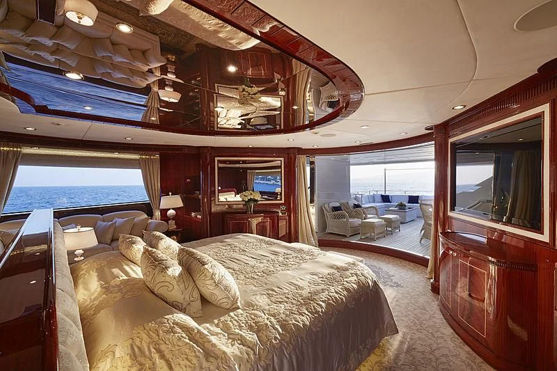a bedroom with a large bed aboard FORWIN Yacht for Sale