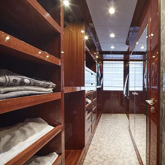 a room with wooden walls and wood floors aboard FORWIN Yacht for Sale