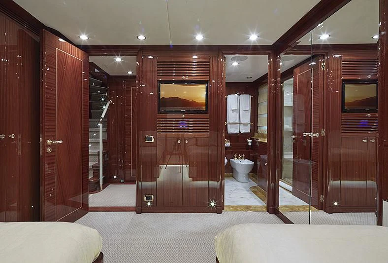 a room with a large wooden closet aboard FORWIN Yacht for Sale