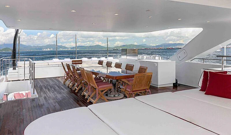 a room with a table and chairs aboard FORWIN Yacht for Sale