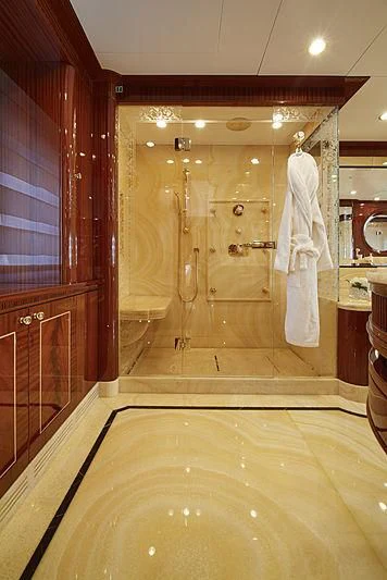 a bathroom with a bathtub and shower aboard FORWIN Yacht for Sale