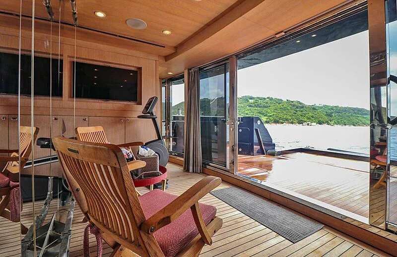 a deck with a view of the water and the land aboard FORWIN Yacht for Sale