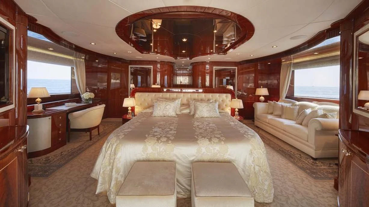 a large bedroom with a large bed aboard FORWIN Yacht for Sale
