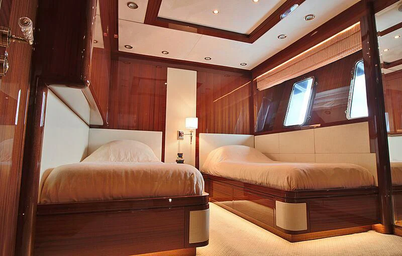 a room with a bed and a couch aboard FORWIN Yacht for Sale