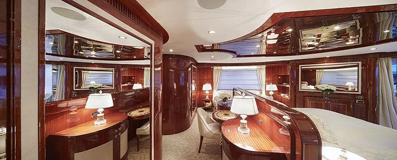 a room with a bed and a desk aboard FORWIN Yacht for Sale