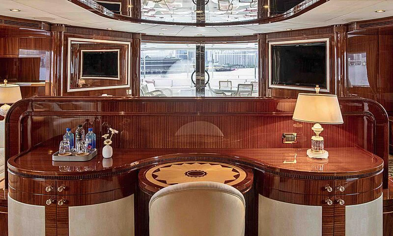 a room with a table and chairs aboard FORWIN Yacht for Sale